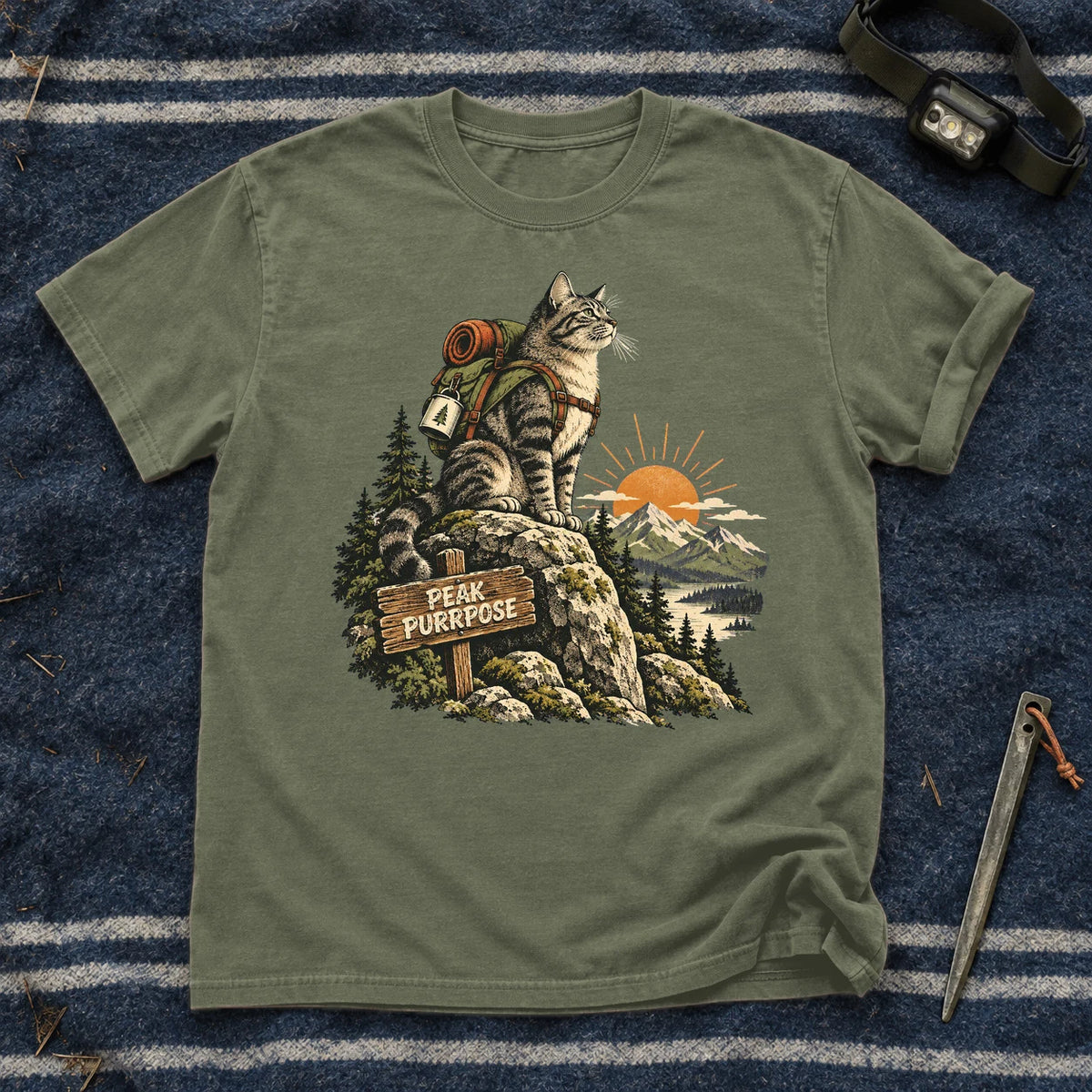 Peak Purrpose Hiking Cat Graphic Tee on Moss Premium Tee