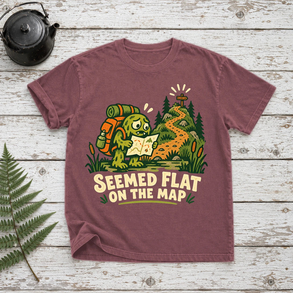 Seemed Flat On The Map Graphic Tee on Brick Premium Tee