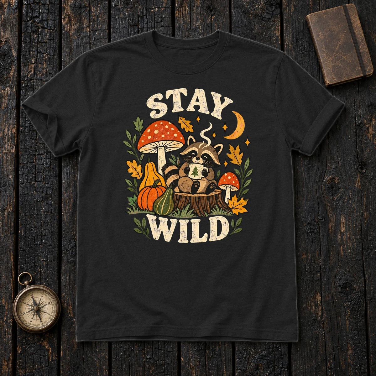 Cozy Autumn Raccoon Stay Wild Graphic Tee on Black Everyday Soft Tee