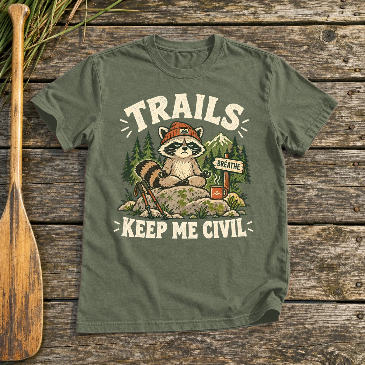 Trails Keep Me Civil Raccoon Graphic Tee on Military Green Everyday Soft Tee