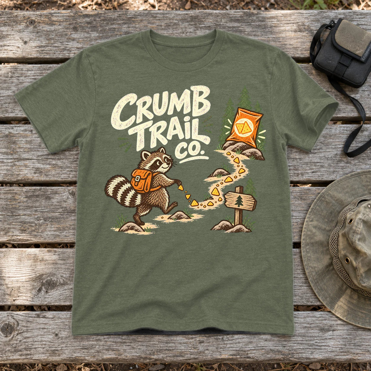 Crumb Trail Co. Raccoon Graphic Tee on Military Green Everyday Soft Tee