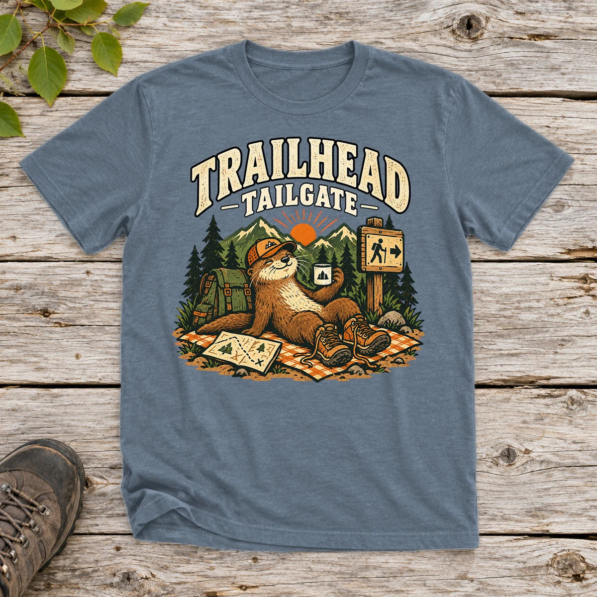 Trailhead Tailgate Otter Graphic Tee on Heather Indigo Everyday Soft Tee