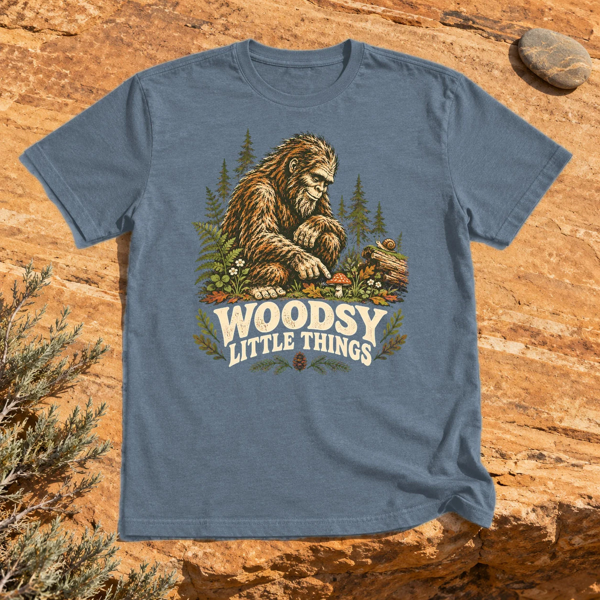 Woodsy Little Things Bigfoot Graphic Tee on Heather Indigo Everyday Soft Tee