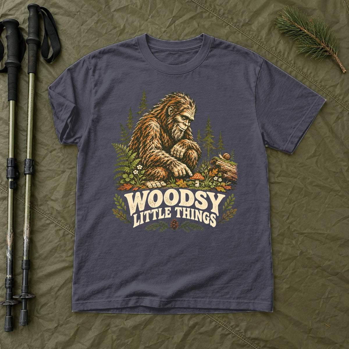 Woodsy Little Things Bigfoot Graphic Tee on Navy Premium Tee