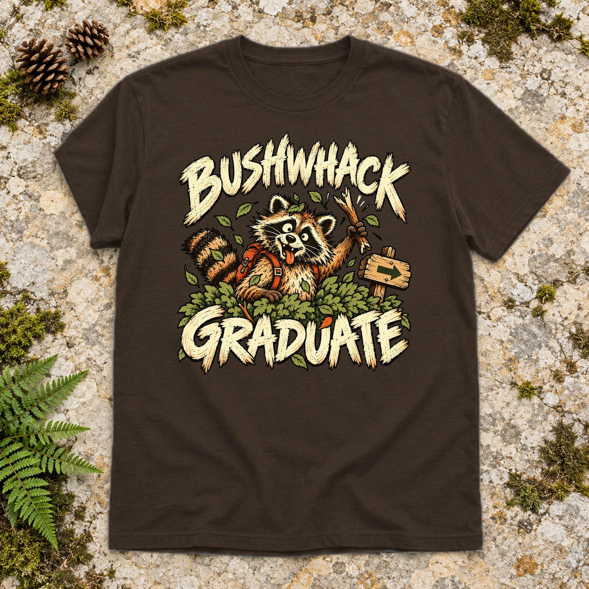 Bushwhack Graduate Raccoon Graphic Tee on Dark Chocolate Everyday Soft Tee