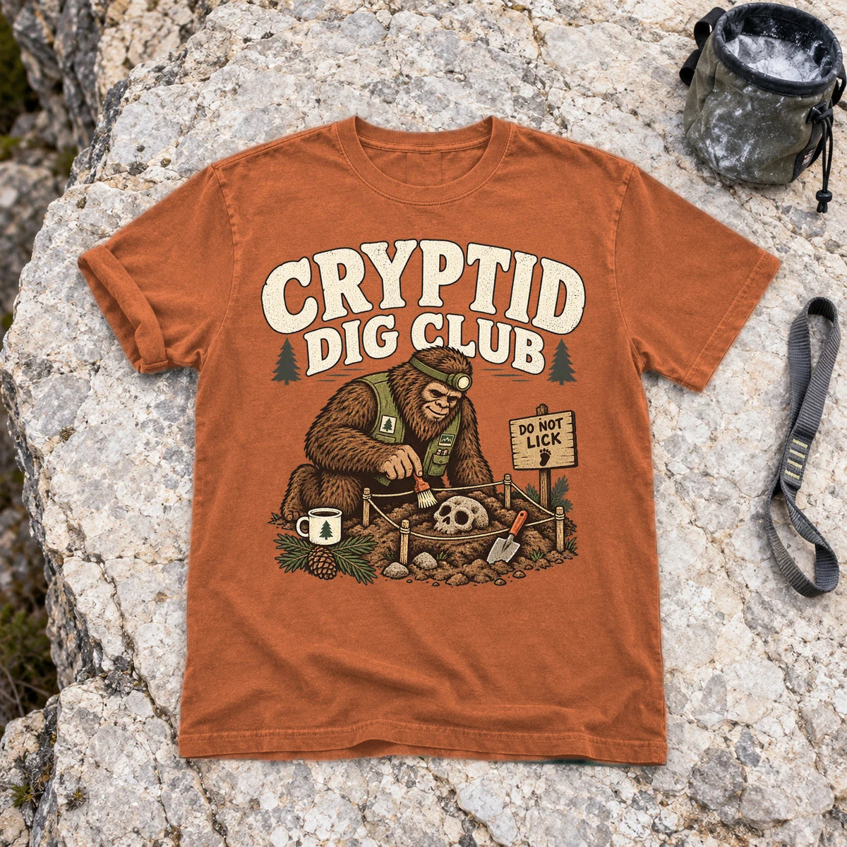 Cryptid Dig Club Graphic Tee on Yam Premium Tee