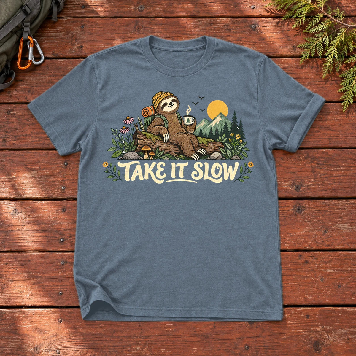 Take It Slow Camping Sloth Graphic Tee on Heather Indigo Everyday Soft Tee