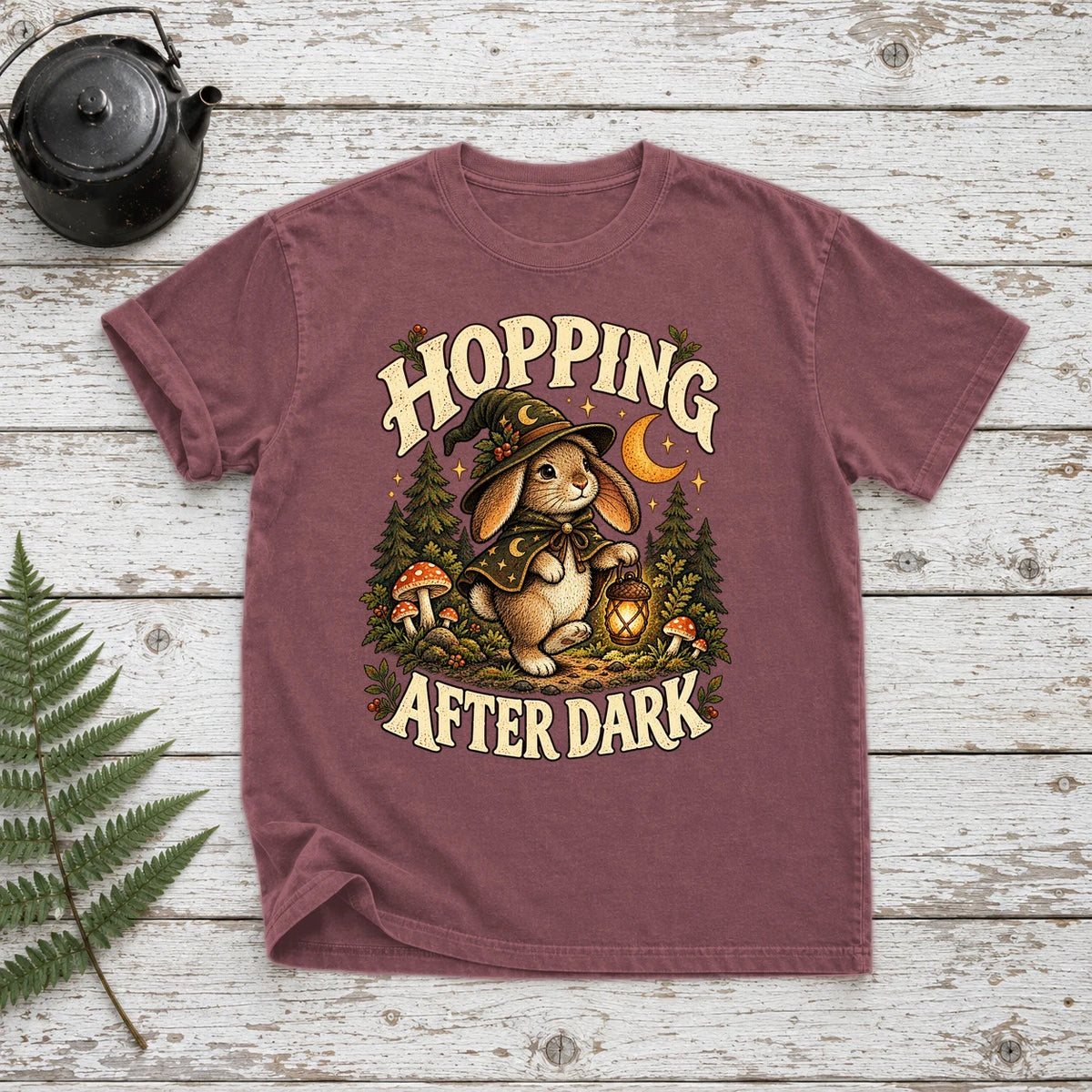 Hopping After Dark Witch Bunny Graphic Tee on Brick Premium Tee