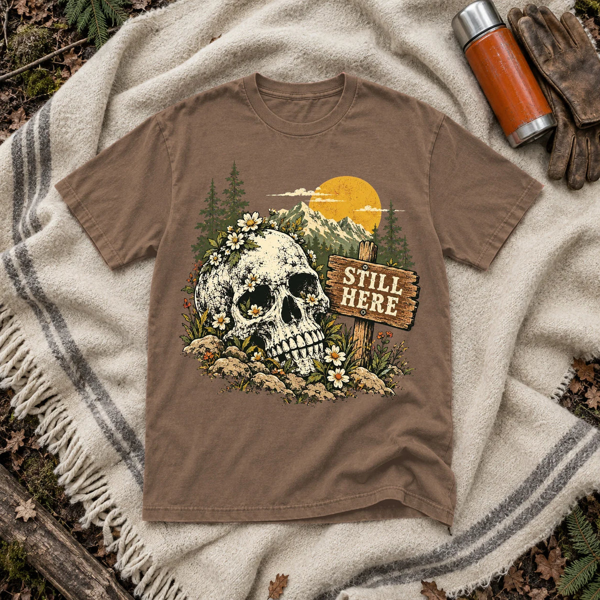 Still Here Mountain Skull Graphic Tee on Espresso Premium Tee