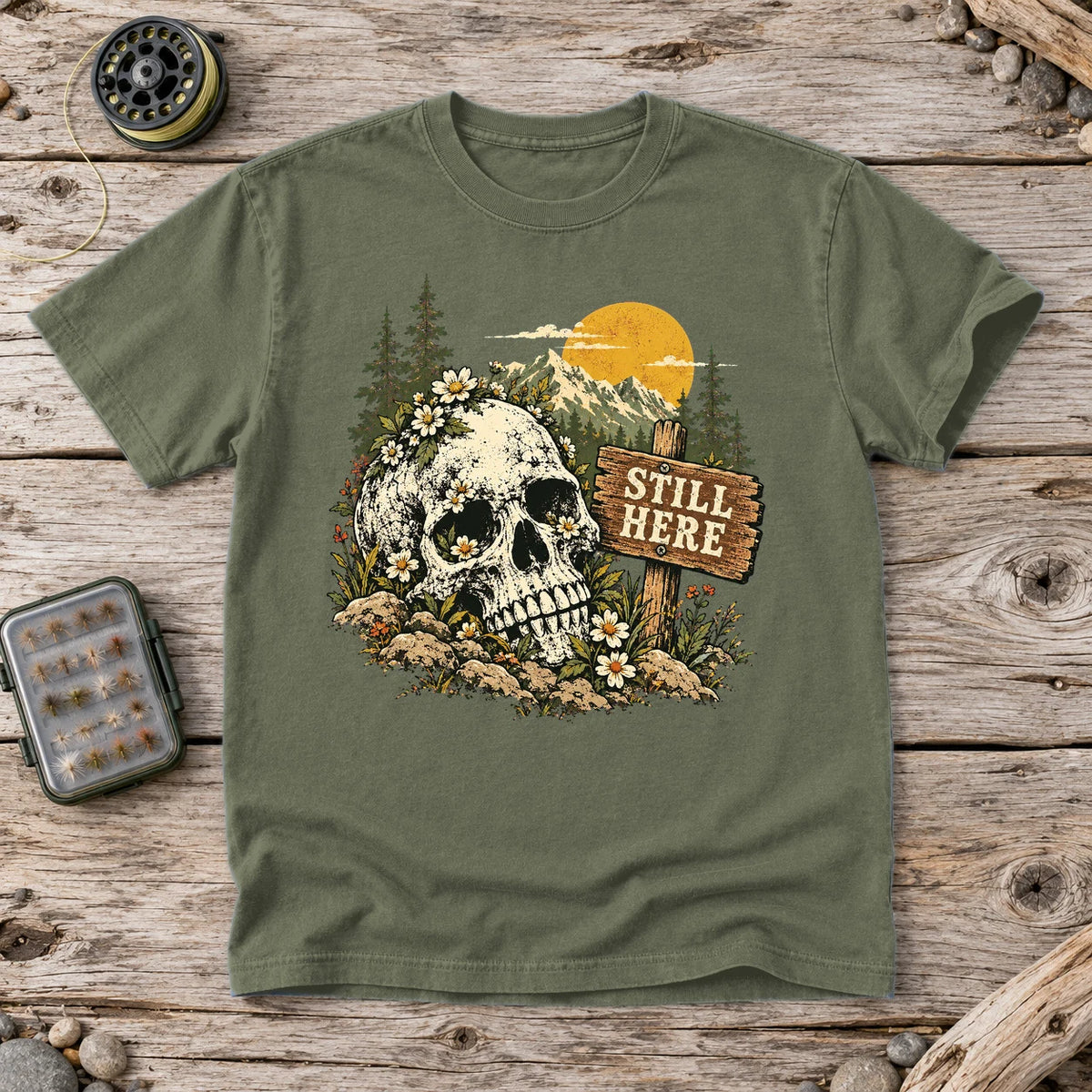 Still Here Mountain Skull Graphic Tee on Moss Premium Tee