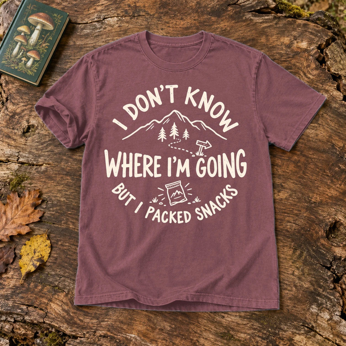 Lost But Packed Snacks Graphic Tee on Brick Premium Tee