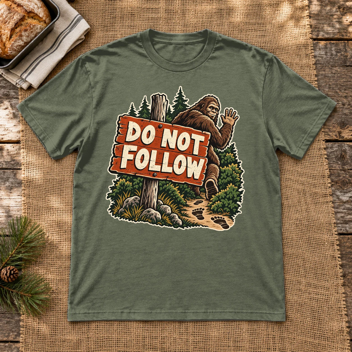 Do Not Follow Vintage Bigfoot Graphic Tee on Military Green Everyday Soft Tee
