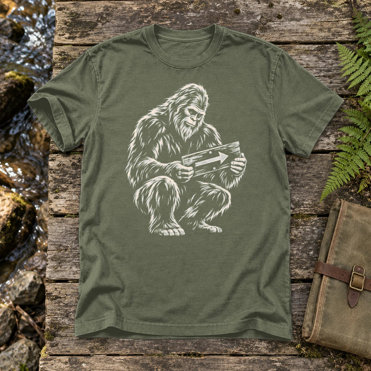 Sasquatch Trail Guide Graphic Tee on Moss Premium Tee