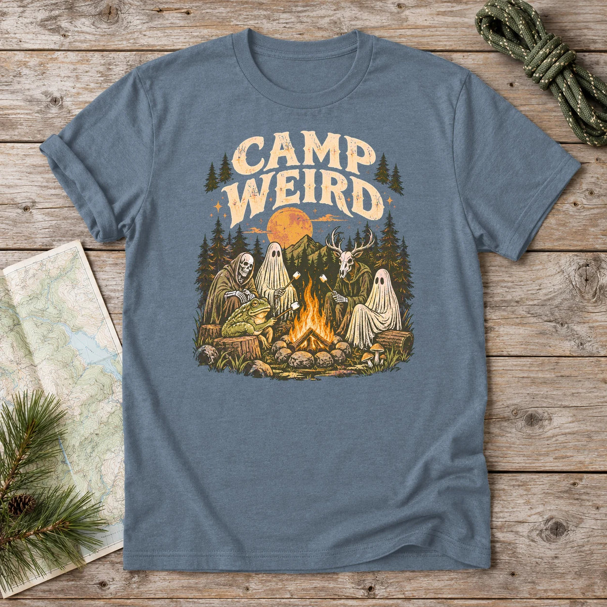Camp Weird Spooky Campfire Graphic Tee on Heather Indigo Everyday Soft Tee