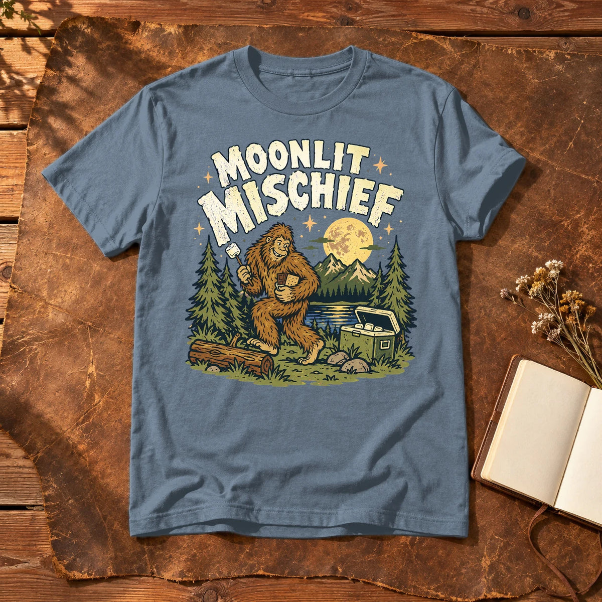 Moonlit Mischief Bigfoot Graphic Tee on Heather Indigo Everyday Soft Tee