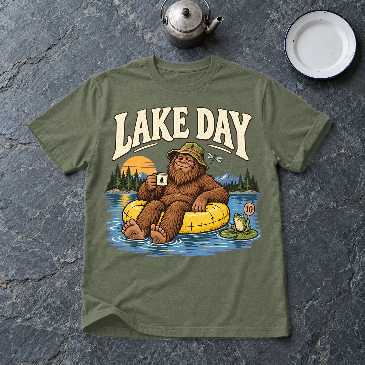 Lake Day Bigfoot Graphic Tee on Military Green Everyday Soft Tee