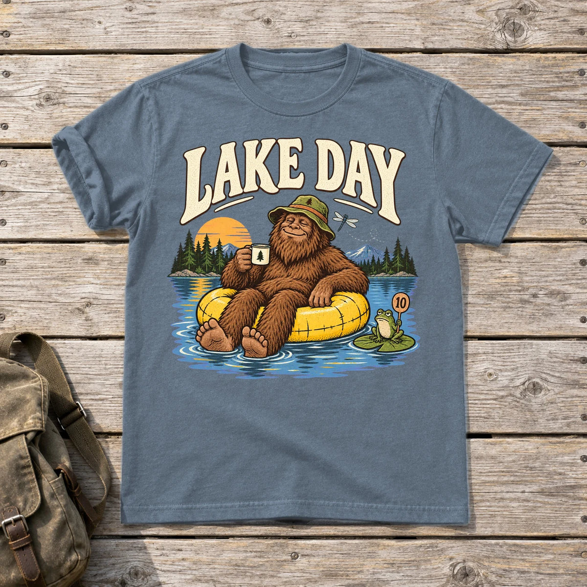 Lake Day Bigfoot Graphic Tee on Heather Indigo Everyday Soft Tee