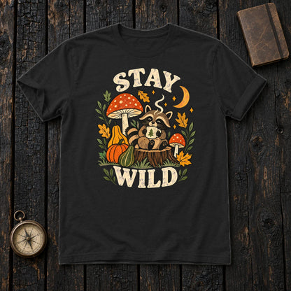 Cozy Autumn Raccoon Stay Wild Graphic Tee on Black Everyday Soft Tee