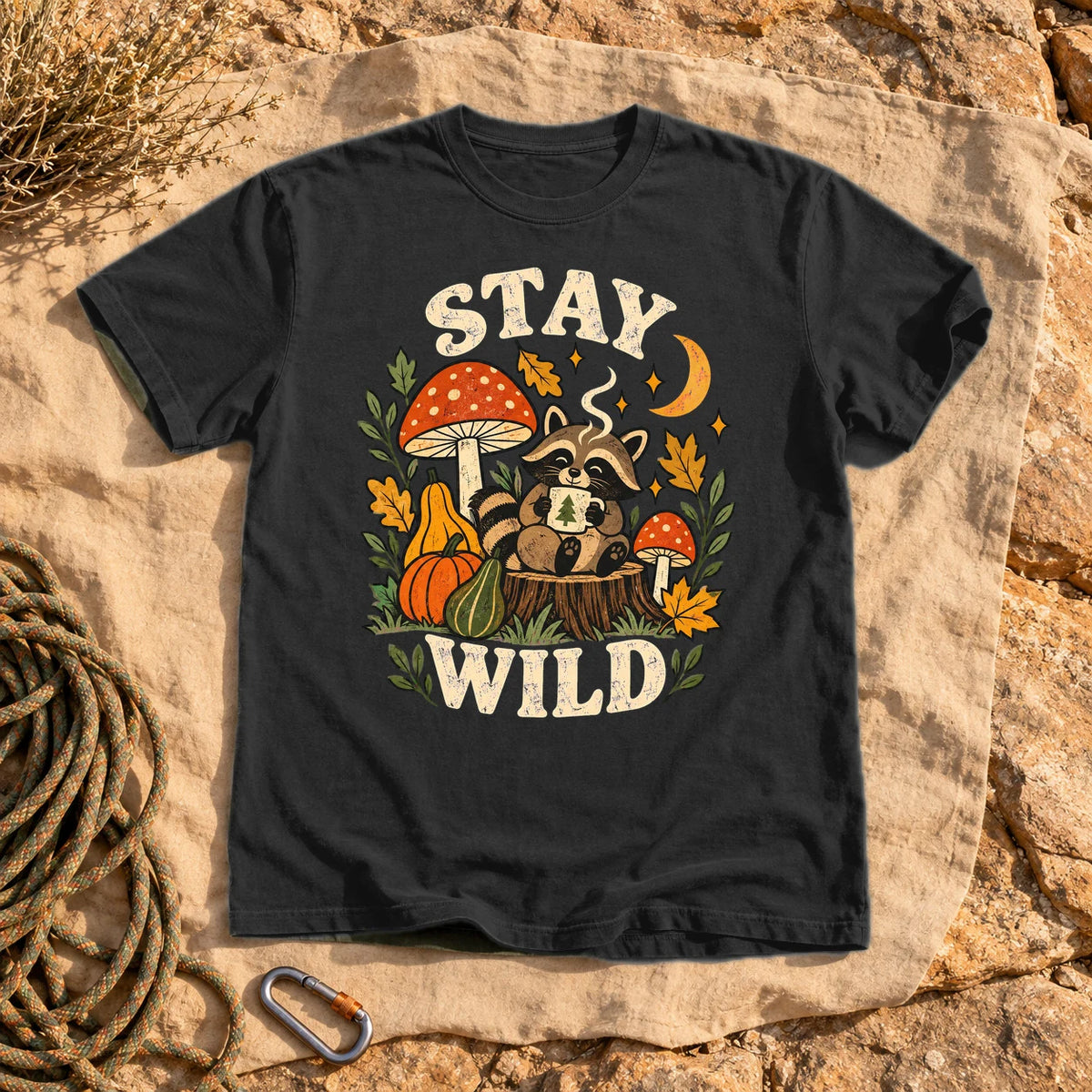 Cozy Autumn Raccoon Stay Wild Graphic Tee on Black Premium Tee
