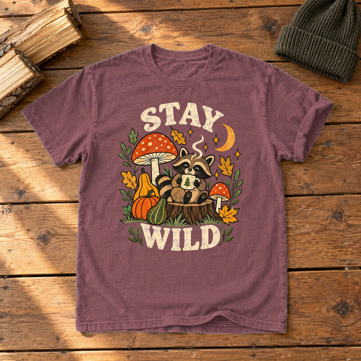 Cozy Autumn Raccoon Stay Wild Graphic Tee on Brick Premium Tee