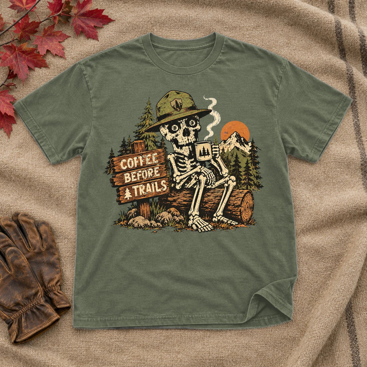 Coffee Before Trails Skeleton Graphic Tee on Military Green Everyday Soft Tee