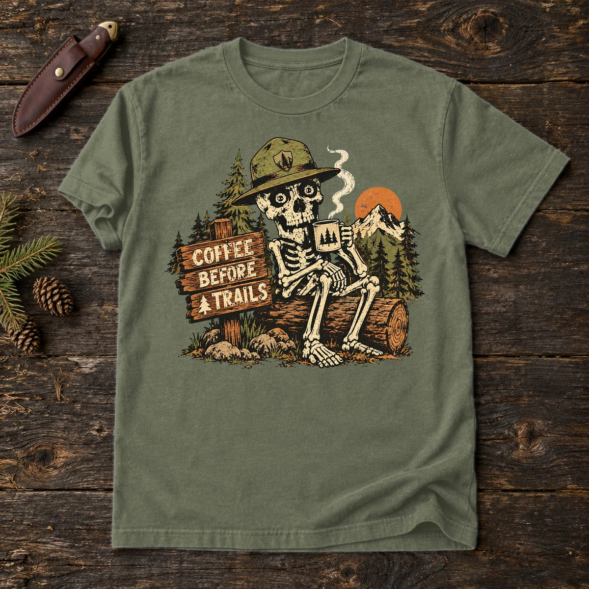 Coffee Before Trails Skeleton Graphic Tee on Moss Premium Tee