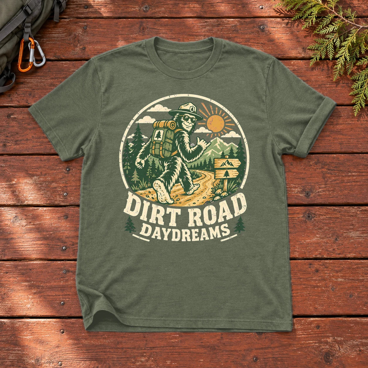 Dirt Road Daydreams Bigfoot Graphic Tee on Military Green Everyday Soft Tee
