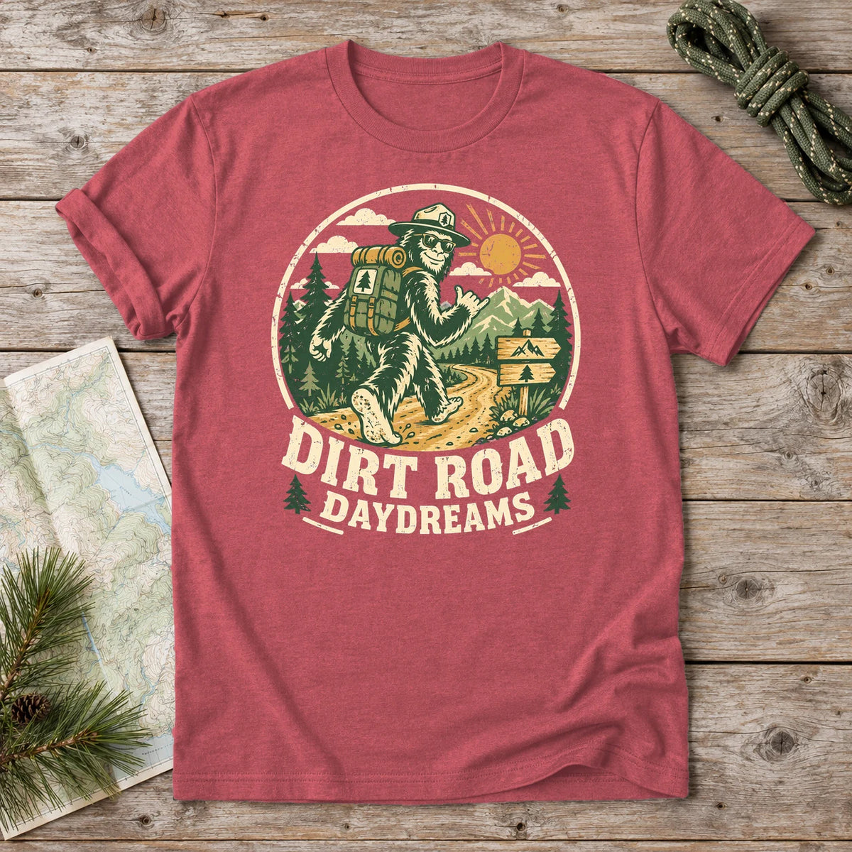 Dirt Road Daydreams Bigfoot Graphic Tee on Heather Red Everyday Soft Tee