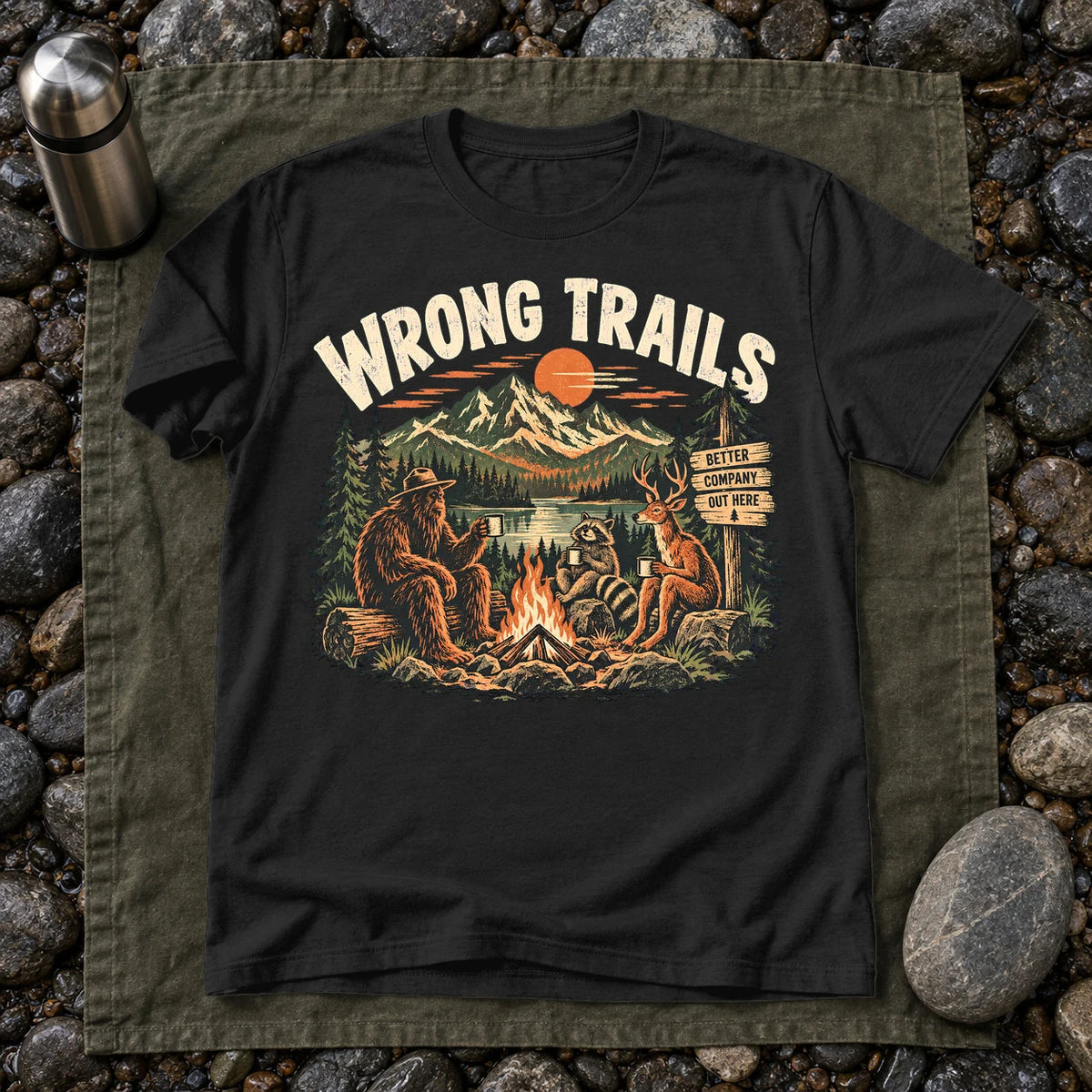 Wrong Trails Bigfoot Campfire Graphic Tee on Black Everyday Soft Tee
