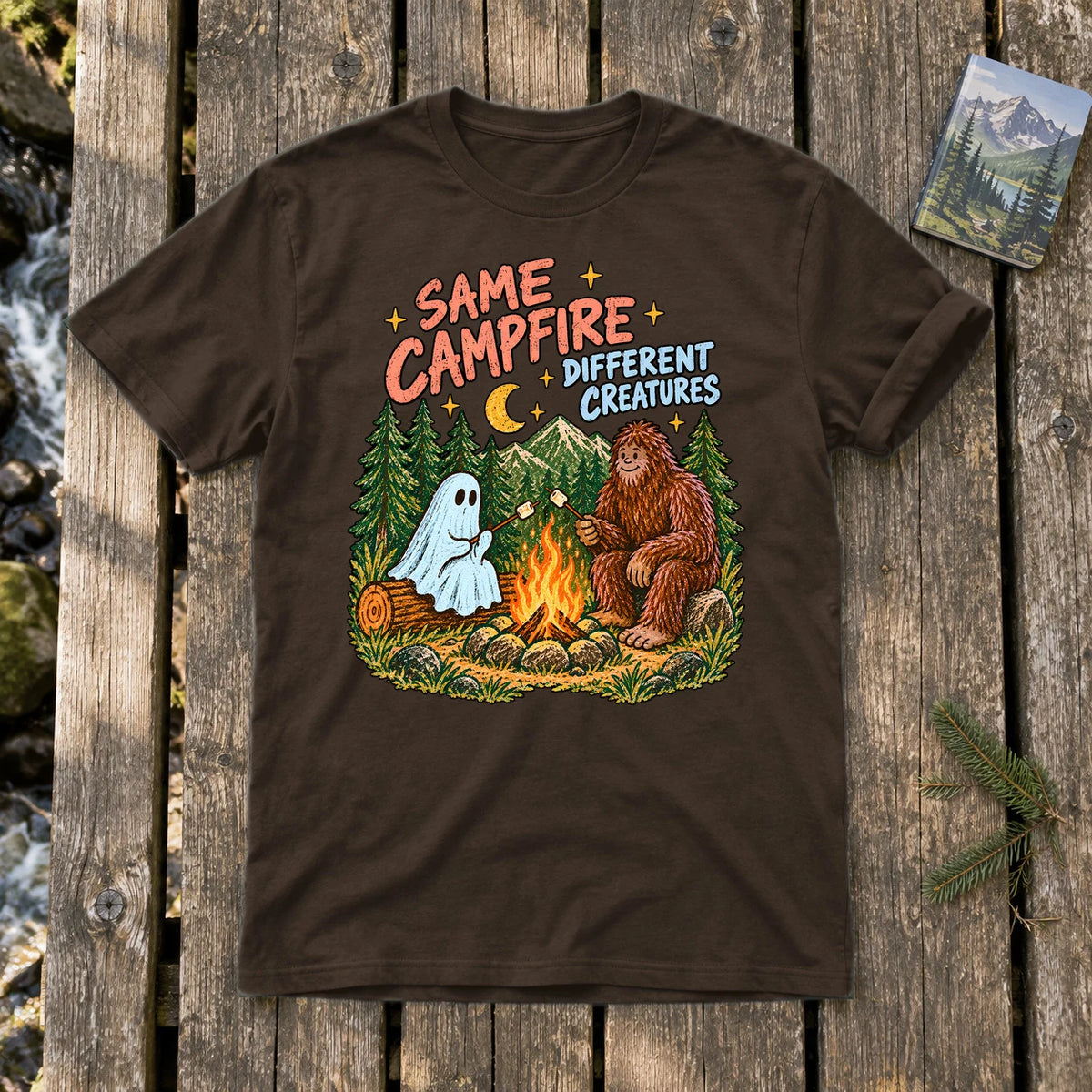 Same Campfire Different Creatures Graphic Tee on Dark Chocolate Everyday Soft Tee