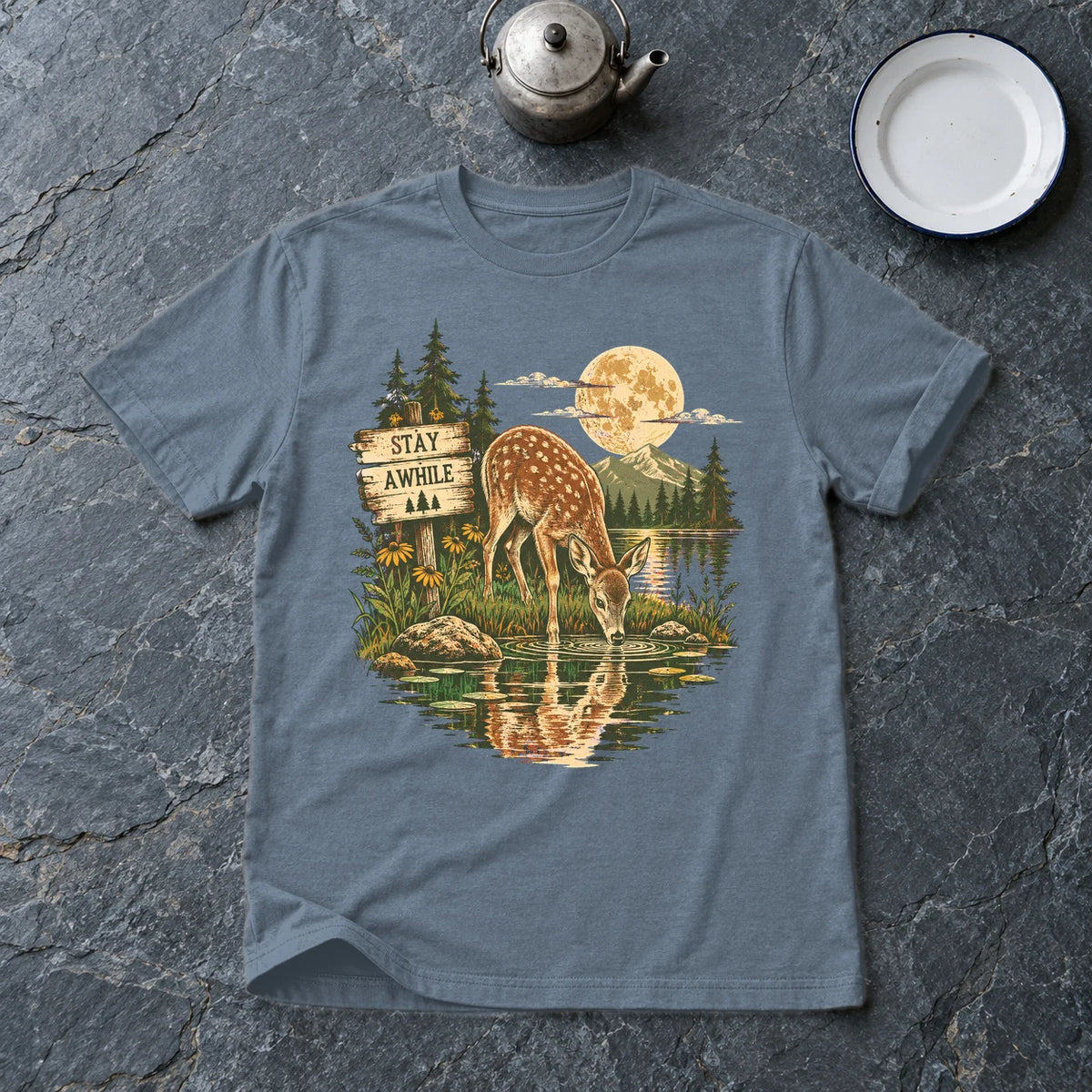 Stay Awhile Wilderness Deer Graphic Tee on Heather Indigo Everyday Soft Tee