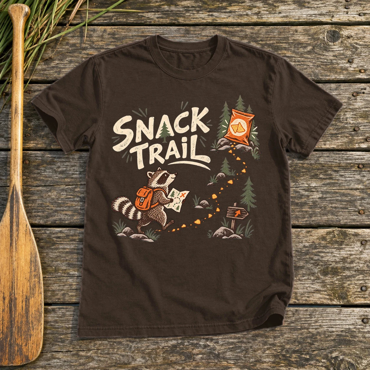Snack Trail Raccoon Graphic Tee on Dark Chocolate Everyday Soft Tee