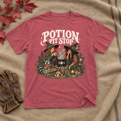 Potion Pit Stop Cozy Witch Graphic Tee on Heather Red Everyday Soft Tee