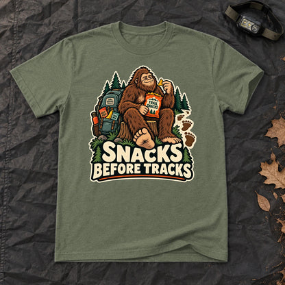 Snacks Before Tracks Bigfoot Graphic Tee on Military Green Everyday Soft Tee