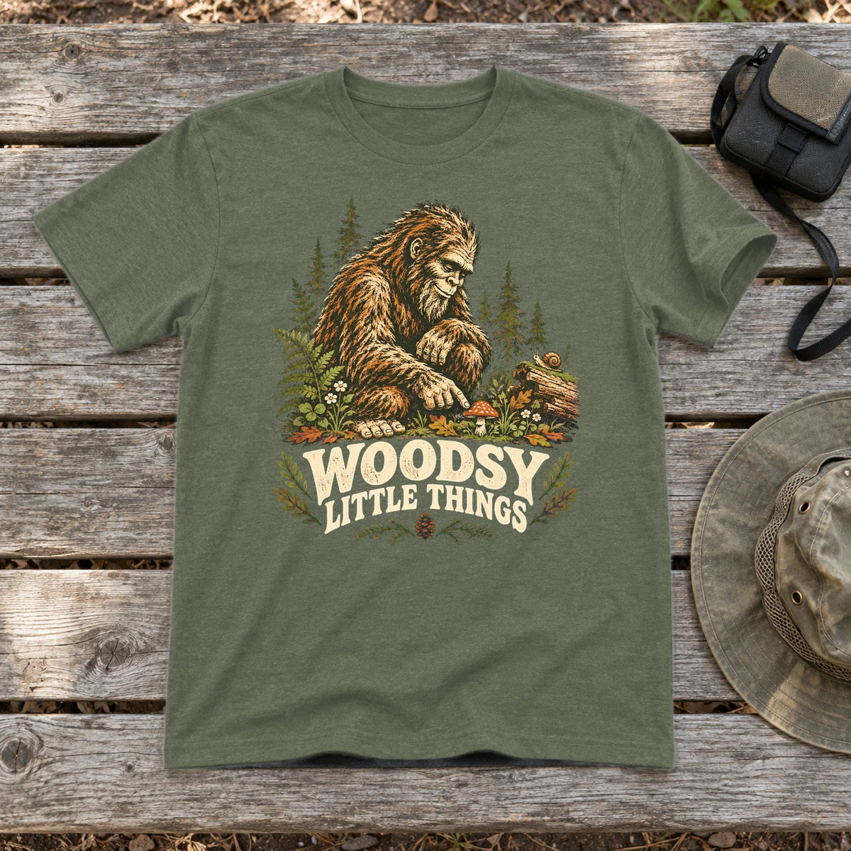 Woodsy Little Things Bigfoot Graphic Tee on Military Green Everyday Soft Tee