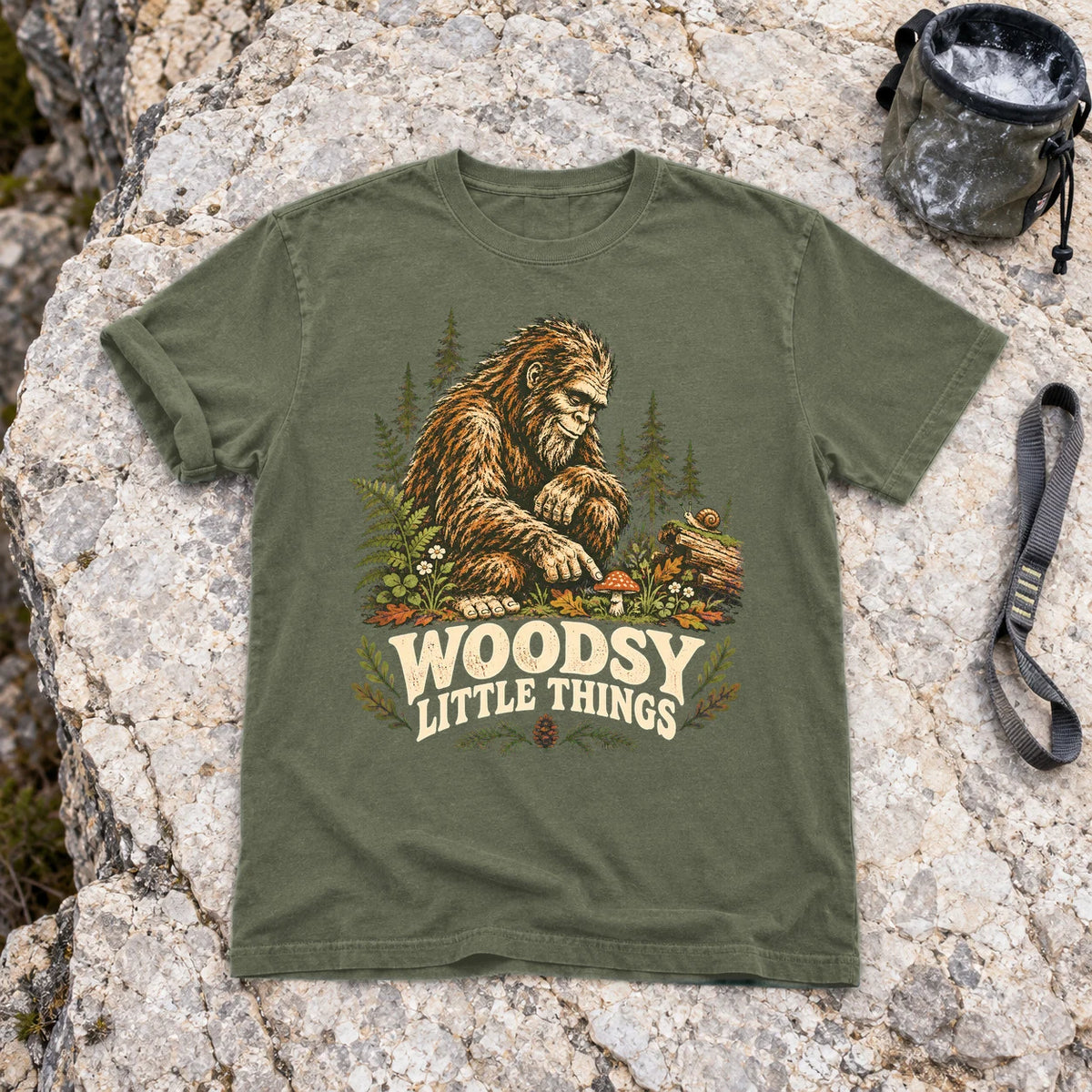 Woodsy Little Things Bigfoot Graphic Tee on Moss Premium Tee