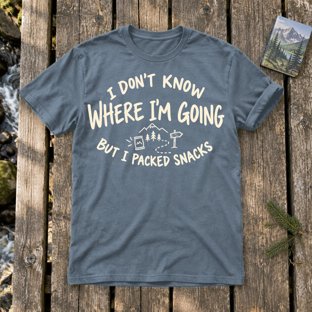 Packed Snacks Adventure Graphic Tee on Heather Indigo Everyday Soft Tee