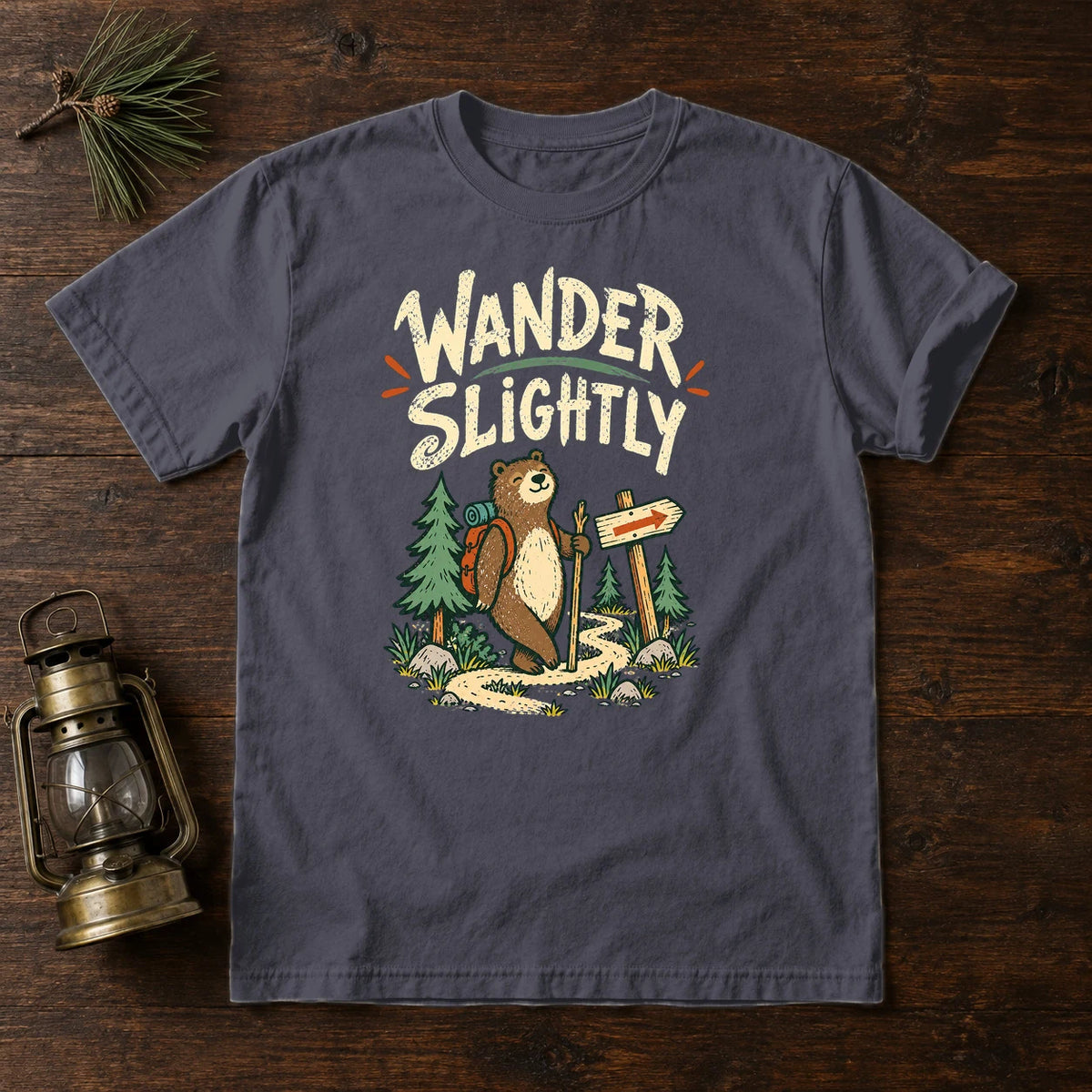 Wander Slightly Hiking Bear Graphic Tee on Navy Premium Tee