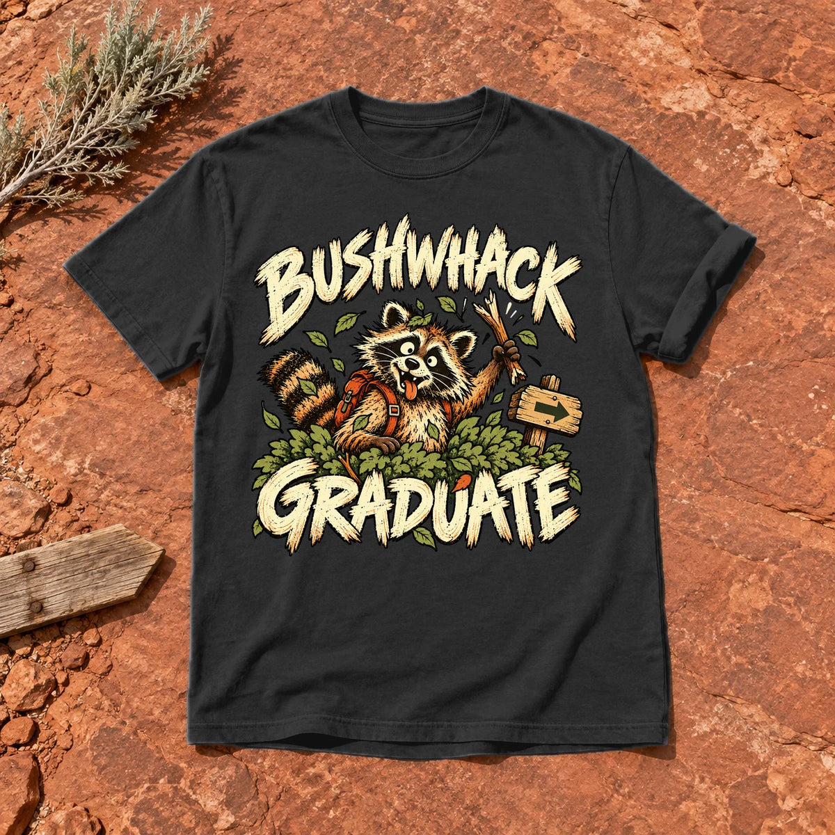 Bushwhack Graduate Raccoon Graphic Tee on Black Premium Tee