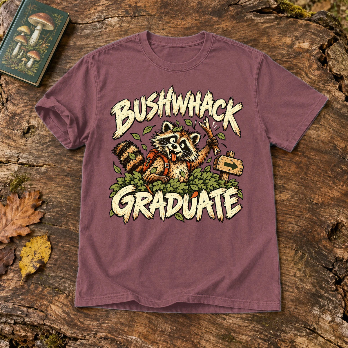 Bushwhack Graduate Raccoon Graphic Tee on Brick Premium Tee
