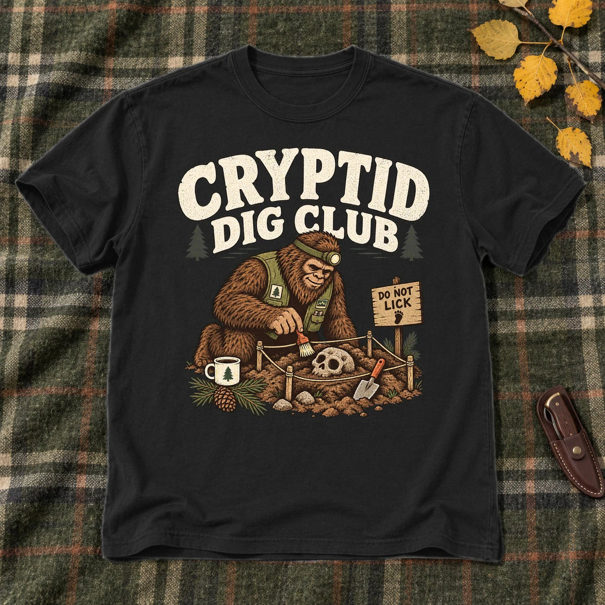 Cryptid Dig Club Graphic Tee on Black Everyday Soft Tee