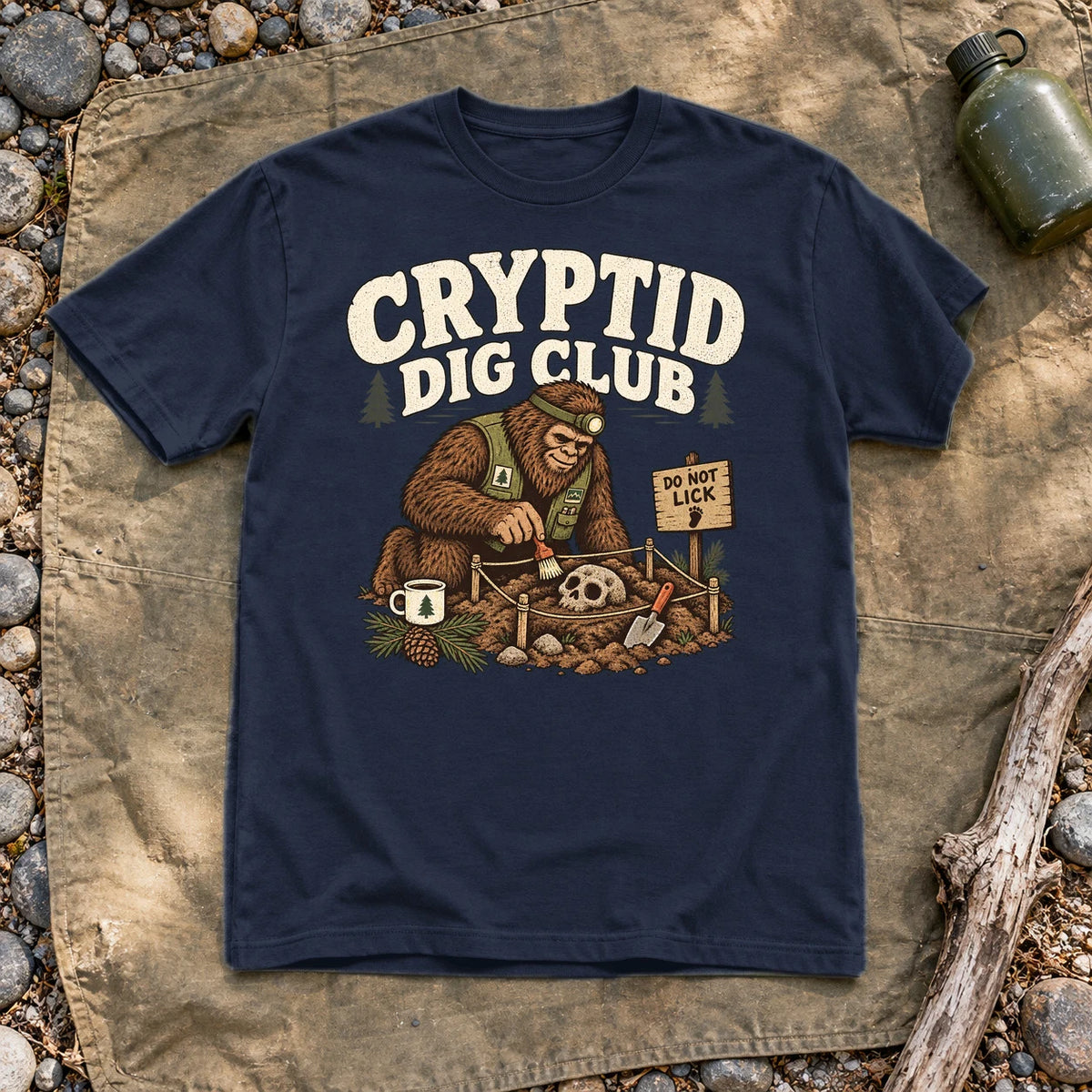 Cryptid Dig Club Graphic Tee on Navy Everyday Soft Tee