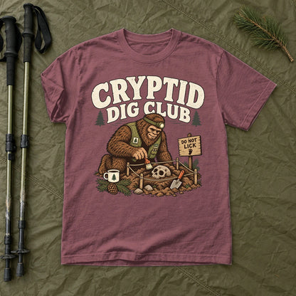 Cryptid Dig Club Graphic Tee on Brick Premium Tee
