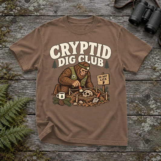 Cryptid Dig Club Graphic Tee on Espresso Premium Tee