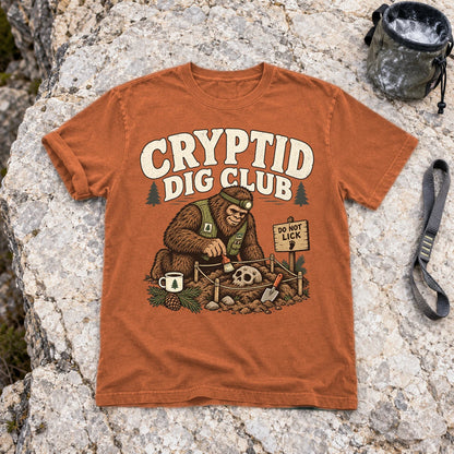 Cryptid Dig Club Graphic Tee on Yam Premium Tee