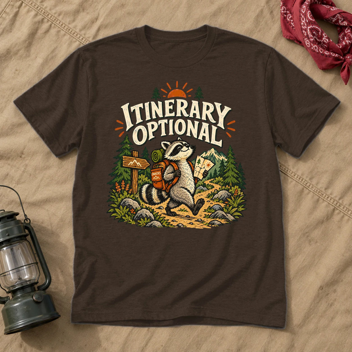 Itinerary Optional Raccoon Graphic Tee on Dark Chocolate Everyday Soft Tee