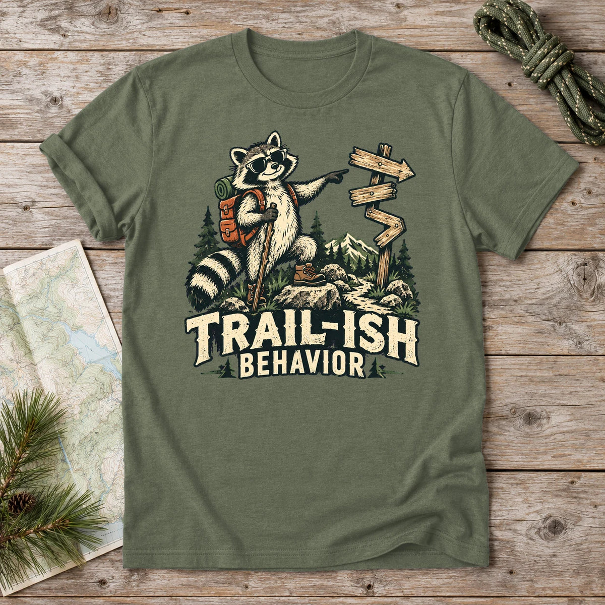 Trail-ish Behavior Raccoon Graphic Tee on Military Green Everyday Soft Tee