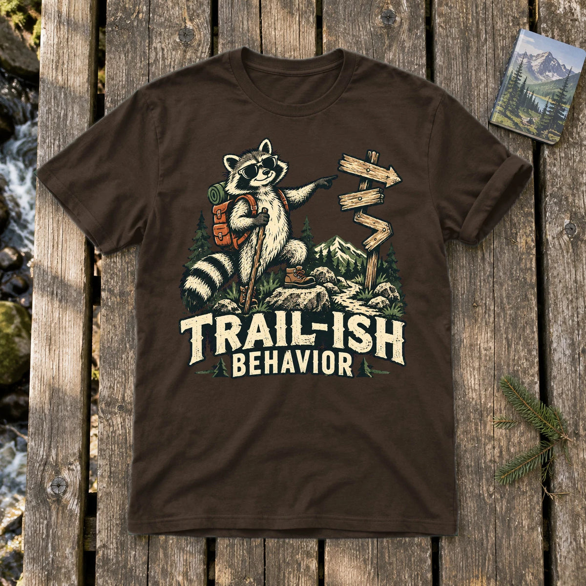 Trail-ish Behavior Raccoon Graphic Tee on Dark Chocolate Everyday Soft Tee