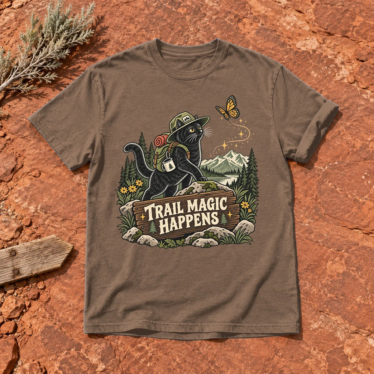 Trail Magic Happens Cat Graphic Tee on Espresso Premium Tee