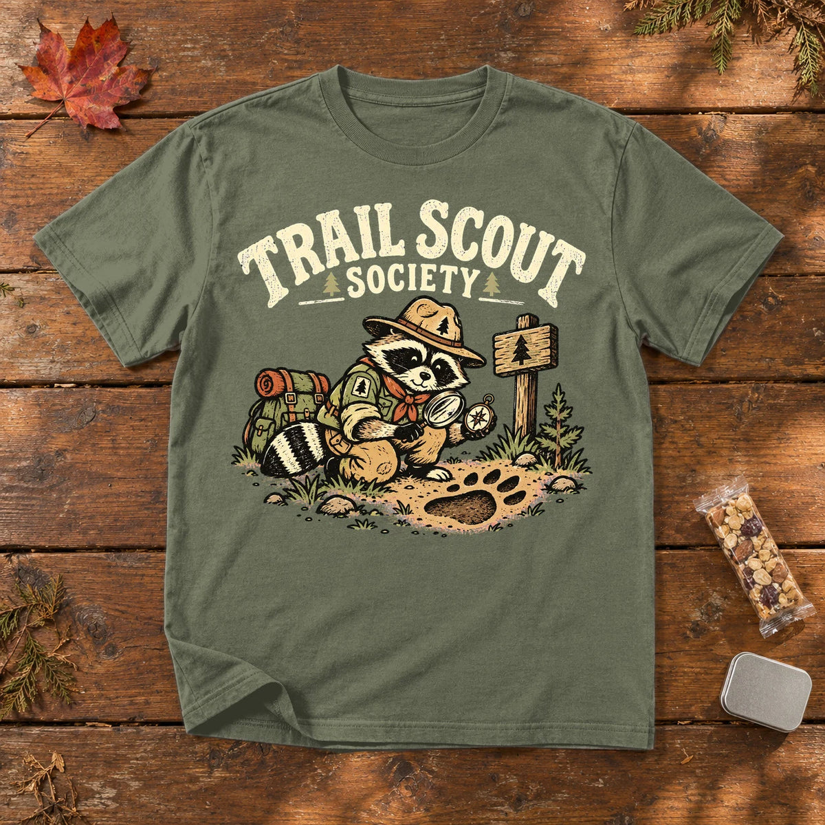 Trail Scout Society Raccoon Graphic Tee on Moss Premium Tee